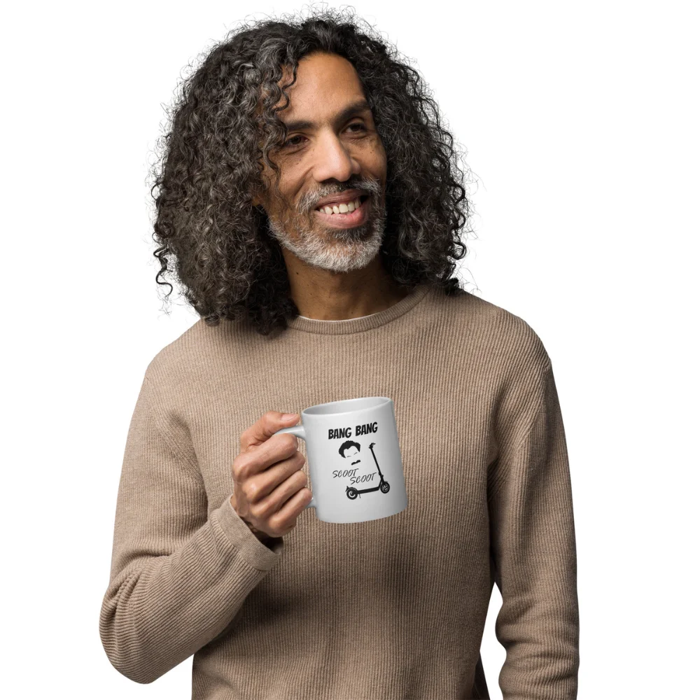 A man holding a Funny E-Scooter Coffee Mug: Bang Bang Scoot Scoot
