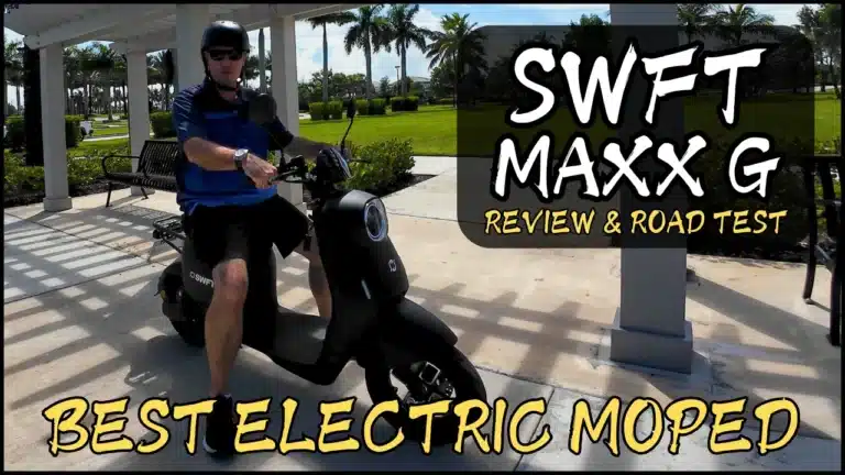 Hobart sitting on the SWFT Max G Electric moped